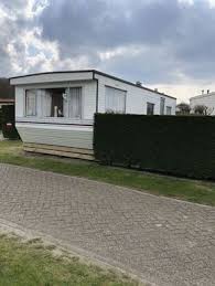 Gepflegtes Mobilheim Skemer Auf Texel Zaun Wlan Mobilheim Skemer In De Koog Holland Niederlande Hundeurlaub Url In 2020 Mobilheim Schwimmbad Mit Sauna Ferienhaus