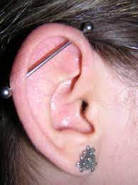 You want someone who can evenly balance the bar in your ear. Industrial Piercing Wikipedia