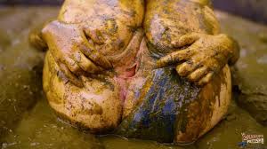 Diving in the Manure Pit - ManureFetish - Hot girl swims in cowshit