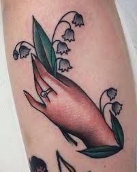 Lily Of The Valley Traditional Bouquet Tattoo Traditional Tattoo Hand Tattoos Bouquet Tattoo