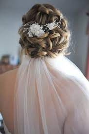 Low Updo With Veil And Flowers Beautiful Wedding Hair Wedding Hairstyles With Veil Wedding Hairstyles