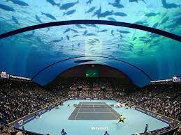 Tennis courts require a clearance area surrounding the court, from the baseline to the backstop and sidestop. Could Dubai Be The Site Of An Underwater Tennis Court Conde Nast Traveler
