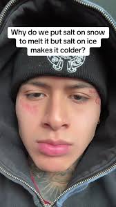 Man Spraying Cooking Salt