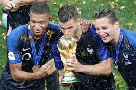 Player profile for florian thauvin in the soccer world cups. France S Kylian Mbappe Lucas Hernandez Florian Thauvin Hold The Trophy After The Final Match Between France And Croatia At The 2018 Soccer World Cup In The Luzhniki Stadium In Moscow Russia Su
