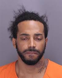 Man arrested for double homicide over dice game