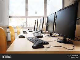 The computer's environment is connected to, e.g., a laptop in a college student's dorm room. Empty Computer Room Image Photo Free Trial Bigstock