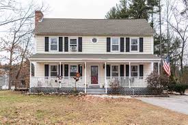 We love the idea of a farmer's porch and so will be adding it back into the facade of the stone house. 1 Colonial Drive Pelham Nh