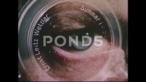 1950s Camera Lens Superimposed Over Human Eye Eye Chart
