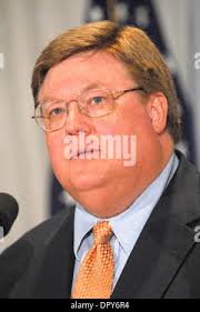 West Virginia Supreme Court Justice Tom McHugh speaks with senior citizens  as he and West Virginia first lady Gayle C. Manchin visit the Marie Redd  Senior Life Enrichment Center