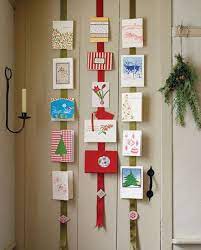 As holiday cards begin to arrive, use paper clips or clothespins to hang them from the string. Cool 49 Brilliant Christmas Card Display Ideas Christmas Card Display Christmas Card Hanger Hanging Christmas Cards