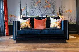 Create a fun and whimsical retreat for your sleep or sofa ensemble with this decorative throw pillow cover. Blue Sofa Orange Pillows Novocom Top