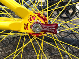 profile racing madeintheusa chain tensioners close up of the hand built standardbykecompany frame dropouts