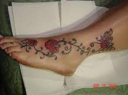 Roses And Vines On Foot To Butterfly On Ankle Foot Tattoos Vine Tattoos Rose Vine Tattoos