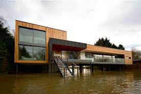 A house in a flood zone 2 area has a 1 in 1000 chance to be hit by a major flood each year if there are no major defenses. Floodplain House Design