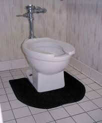 Commercial toilet mat reduces odor place on floor around toilet. Bathroom Mats And Urinal Mats