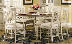 Wooden center tables, dining room sets, sofas and dressers look old but stylish in their distressed state. French Country Dining Table House N Decor