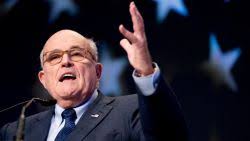 Giuliani shows up in court, but not for Trump