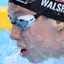 2025 World Swimming Championships: Gretchen Walsh defies illness to win  women's 100m butterfly