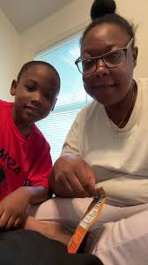 Mom Shows Son How to Use Peeler