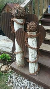 Garden Angels Made Of Rusty Tin Roof And Upcycled House Posts Garden Angels Rusty Tin Tin Roof