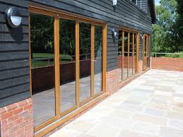 Cut the wooden batons to the right size and place them all around the door opening. Timber Bi Fold Doors Folding Patio Doors Bifold Doors Uk