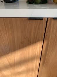 Back in the day, this wasn't a very common design; Walnut Veneer Kitchen Cabinets