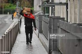 1,036 Delivery Agent Photos and Premium High Res Pictures - Getty Images