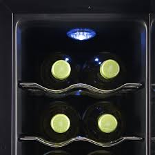 Black And Decker Under Cabinet Lighting Reviews 12 Bottle Capacity Thermoelectric Wine Cellar Electronic Touch Controls And Led Display Black Cabinet With Uv Gl Wine Cellar Black Cabinets Interior Lighting
