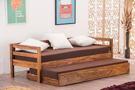 Pick such sofas from brands such as sreebala, hometown, adorn india and meera handicraft. Buy Solid Wood Capital Sofa Cum Bed Trundle Online In India Latest Sofa Designs Collection Saraf Furniture