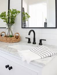The terms modern and farmhouse might have once seemed like opposites, but this combination of design styles is now trending in a big way. Modern Farmhouse Master Bathroom Renovation With Delta The Process Reveal 1111 Light Lane