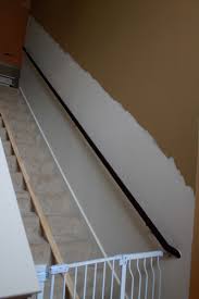 Step away from the wall and look at the rail. Adding Moulding To Your Staircase Decor Chick Guest Post Pretty Handy Girl