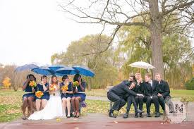 Take Silly Pictures With Your Wedding Party To Brighten A Rainy Wedding Day Rainy Wedding Photos Rainy Wedding Wedding Humor
