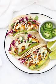 Coat them first in seasoned flour, then beaten egg and finally assemble the tacos: The Best Fish Tacos With Honey Lime Cilantro Slaw One Lovely Life