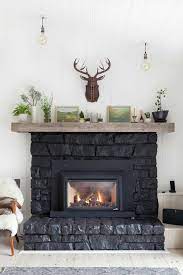 Edgy Dark Fireplace Trendir Fireplace Mantel Decor Stone Fireplace Designs Fireplace Design