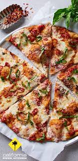 Take A Slice Out Of Life Dive Into Our Classic Margherita Pizza Made With Italian Tomatoes Fresh Mozzarella Fresh Bas Food Recipes California Pizza Kitchen