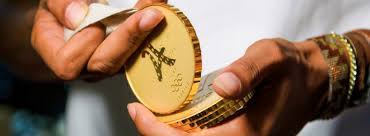 Philippe starck presents the paris 2024 olympic medal, made for sharing. Philippe Starck S Paris 2024 Olympic Medals Are Designed To Be Shared