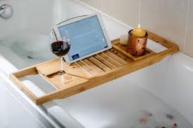 Bamboo bathtub tray caddy with wine. 5 Bamboo Bathtub Caddies That You Can Buy Right Now