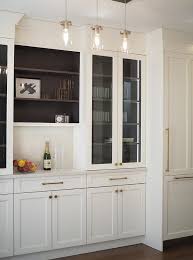 The choice between painting and staining your cabinets will depend on a number of factors. Glass Front Kitchen Bar Display Cabinets Transitional Kitchen