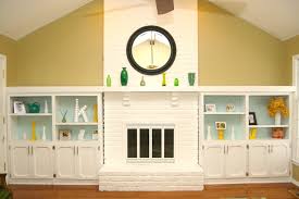 Looking for an instant change to your brick fireplace? Remodelaholic Dramatic Results Of A White Painted Brick Fireplace