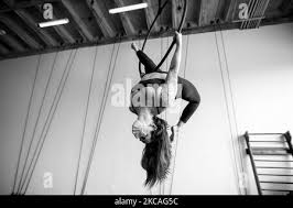 Ariel dancer Lindsay Maxfield rehearses in a surgical mask in her studio in  Houston, Texas
