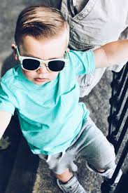 Selective focus photography of boy wearing gray and yellow shirt. Toddler Boy Haircut Ideas First Thyme Mom