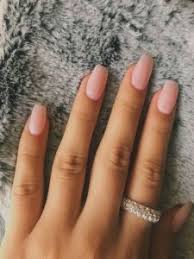 For simple yet chic nails, paint your nails with light pink, but for one finger make use of black and white enamel to give a marble effect. Light Pink Ombre Acrylic Nails Nail And Manicure Trends