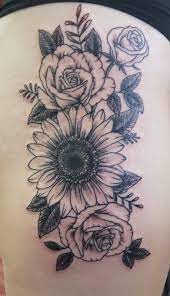 However what exactly does the rose represent. Sunflower Roses Tattoo Rose Tattoos Sunflower Tattoos Tattoos