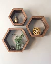 Handmade Hexagon Shelves Crafted From Wood And Finished With A Walnut And Subtle Rose Gold Interior The Shelves C Simple Apartment Decor Hexagon Shelves Decor