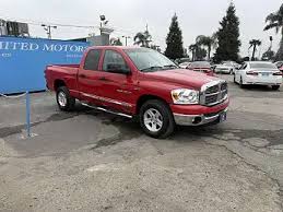 Image result for Deep Coral Red 2007 Dodge Truck
