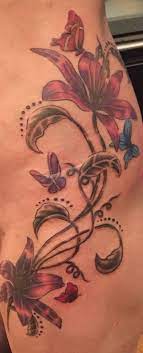 Hip Piece Lilies And Butterflies Butterfly Tattoo Hip Tattoo Butterfly Tattoo On Shoulder