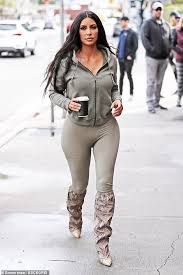 kim kardashian shows off her flawless figure in skintight leggings kardashian style kim kardashian show kardashian outfit