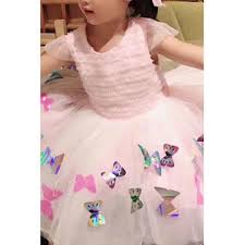 Birthday party caps, blowers and candles on wooden table. Zumeet Toodler Baby Girls Butterfly Birthday Party Dress