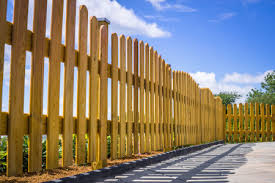 Staining wooden fence