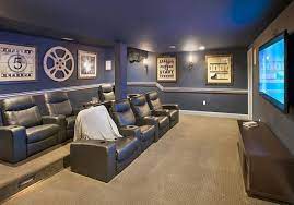 The tiered seating in this home theater, ensures unobstructed visibility from any seat and the wall to wall carpet provides additional sound absorption. Home Theater Design Ideas Diy